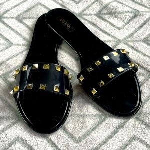 Ann More black jelly studded slides size 9